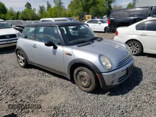 2006 MINI Hardtop with VIN WMWRC33546TK70683, listed as a Copart auction lot 54929365 with 109,484 mi miles and Salvage title. Bid and sale history available at DreamBid. Image 4.