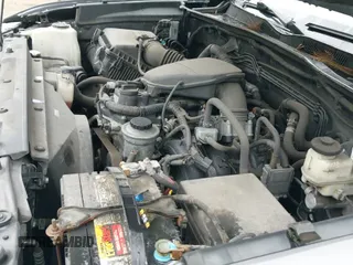 2018 Toyota Tacoma SR z VIN 5TFRX5GNXJX128398, wystawiony jako IAAI lot #41770390 z przebiegiem 165 813 mil mil oraz . Historia ofert i sprzedaży dostępna na DreamBid. Obrazek 19.