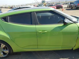 2012 Hyundai Veloster w/Gray Int z VIN KMHTC6AD5CU040673, wystawiony jako IAAI lot #41491429 z przebiegiem Nie podano mil oraz . Historia ofert i sprzedaży dostępna na DreamBid. Obrazek 12.