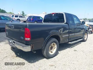 1998 Ford F-150 with VIN 1FTZX1762WNB88647, listed as a IAAI auction lot 42682271 with 187,520 mi miles and . Bid and sale history available at DreamBid. Image 4.