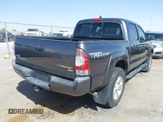 2014 Toyota Tacoma PreRunner with VIN 3TMJU4GN0EM164077, listed as a IAAI auction lot 41712542 with 69,443 mi miles. Bid and sale history available at carsss.com. Image 4.