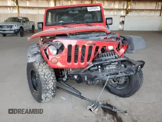 2012 Jeep Wrangler Unlimited Call of Duty MW3 with VIN 1C4BJWFGXCL225459, listed as a Copart auction lot 60699895 with 98,196 mi miles and Salvage title. Bid and sale history available at DreamBid. Image 5.