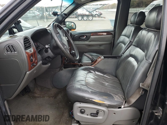 2004 GMC Envoy XL SLE with VIN 1GKET16S946117515, listed as a Copart auction lot 43554475 with 0 mi miles and Salvage Title. Bid and sale history available at carsss.com. Image 7.