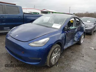2023 Tesla Model Y Long Range with VIN 7SAYGDEE7PF673988, listed as a IAAI auction lot 41057651 with 29,683 mi miles and . Bid and sale history available at DreamBid. Image 19.