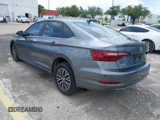 2021 Volkswagen Jetta S z VIN 3VWC57BU4MM009727, wystawiony jako IAAI lot #42339309 z przebiegiem 52 395 mil mil oraz . Historia ofert i sprzedaży dostępna na DreamBid. Obrazek 3.
