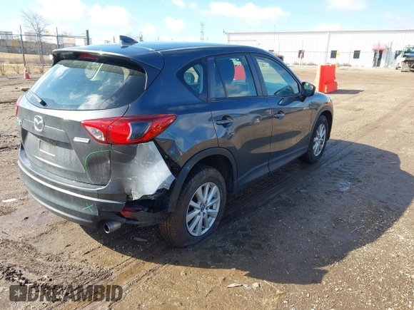 2016 Mazda CX-5 Sport with VIN JM3KE4BY5G0829927, listed as a IAAI auction lot 41678552 with 121,476 mi miles. Bid and sale history available at carsss.com. Image 4.