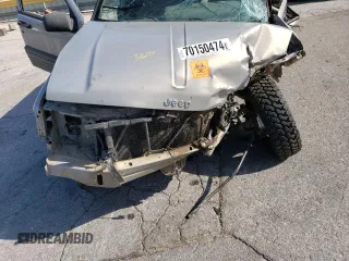 1994 Jeep Grand Cherokee Laredo z VIN 1J4GZ58S5RC328902, wystawiony jako Copart lot #70150474 z przebiegiem 195 604 mil mil oraz Szkoda całkowita • Salvage title. Historia ofert i sprzedaży dostępna na DreamBid. Obrazek 12.
