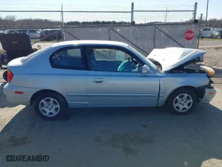2005 Hyundai Accent GLS with VIN KMHCG35C15U351962, listed as a IAAI auction lot 41824462 with 101,970 mi miles. Bid and sale history available at carsss.com. Image 13.