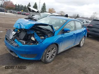 2017 Ford Focus SE with VIN 1FADP3F24HL243981, listed as a IAAI auction lot 40987789 with 56,988 mi miles and . Bid and sale history available at DreamBid. Image 17.