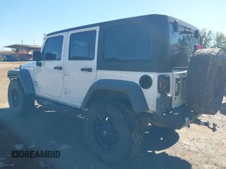 2017 Jeep Wrangler Unlimited Sport with VIN 1C4BJWDG4HL502861, listed as a IAAI auction lot 40895010 with 62,970 mi miles. Bid and sale history available at carsss.com. Image 3.