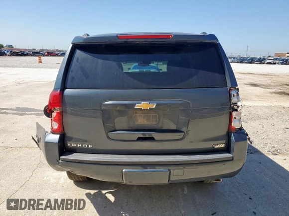 2019 Chevrolet Tahoe LT with VIN 1GNSCBKC0KR273948, listed as a Copart auction lot 61309785 with 155,428 mi miles and Salvage title. Bid and sale history available at DreamBid. Image 6.