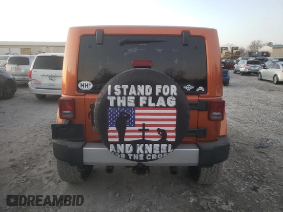 2011 Jeep Wrangler Sahara with VIN 1J4GA5D11BL627667, listed as a Copart auction lot 87227054 with 124,009 mi miles and Clean Title. Bid and sale history available at DreamBid. Image 6.