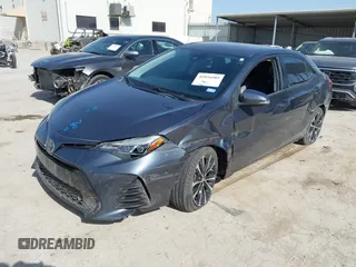 2019 Toyota Corolla L with VIN 5YFBURHE9KP910059, listed as a IAAI auction lot 41856905 with 104,096 mi miles and . Bid and sale history available at DreamBid. Image 2.