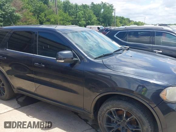 2012 Dodge Durango R/T with VIN 1C4SDJCT4CC337959, listed as a IAAI auction lot 42344317 with 187,429 mi miles and . Bid and sale history available at DreamBid. Image 13.