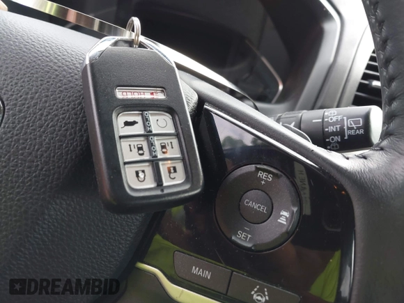 2018 Honda Odyssey EX-L with VIN 5FNRL6H77JB047919, listed as a IAAI auction lot 42112505 with 108,706 mi miles and . Bid and sale history available at DreamBid. Image 11.