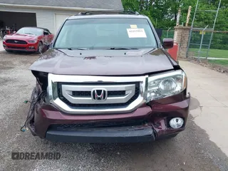 2011 Honda Pilot EX-L z VIN 5FNYF4H68BB057469, wystawiony jako IAAI lot #42252913 z przebiegiem 175 866 mil mil oraz . Historia ofert i sprzedaży dostępna na DreamBid. Obrazek 13.