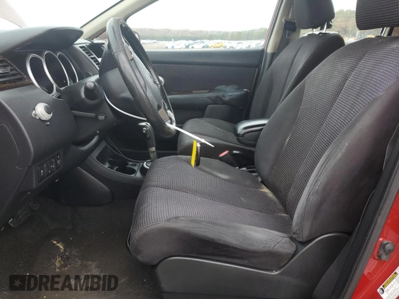 2010 Nissan Versa 1.8 S with VIN 3N1BC1AP4AL371722, listed as a Copart auction lot 72641144 with 128,445 mi miles and Salvage Title. Bid and sale history available at carsss.com. Image 7.