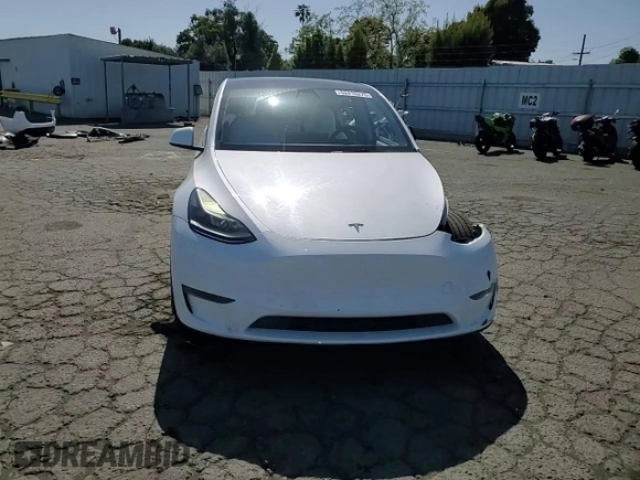 2021 Tesla Model Y Performance z VIN 5YJYGDEF2MF277467, wystawiony jako Copart lot #52410275 z przebiegiem 57 116 mil mil oraz Szkoda całkowita • Salvage title. Historia ofert i sprzedaży dostępna na DreamBid. Obrazek 11.