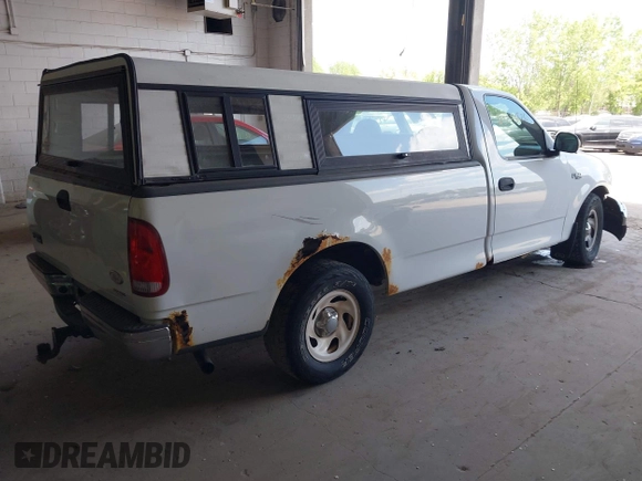 2004 Ford F-150 XL with VIN 2FTRF17214CA28696, listed as a IAAI auction lot 42246526 with 132,403 mi miles and . Bid and sale history available at DreamBid. Image 4.