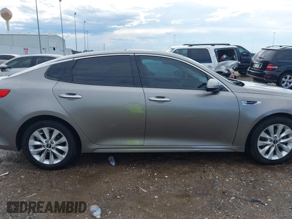 2016 Kia Optima EX with VIN 5XXGU4L39GG107329, listed as a IAAI auction lot 42455013 with 109,364 mi miles and . Bid and sale history available at DreamBid. Image 13.