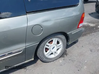 2001 Ford Windstar SE with VIN 2FMDA52441BA08464, listed as a IAAI auction lot 42178086 with 121,683 mi miles and . Bid and sale history available at carsss.com. Image 6.