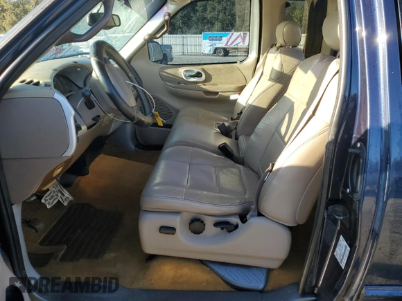 2002 Ford F-150 XL with VIN 1FTRX17L72NA39909, listed as a Copart auction lot 76376994 with 175,926 mi miles and Salvage title. Bid and sale history available at DreamBid. Image 7.