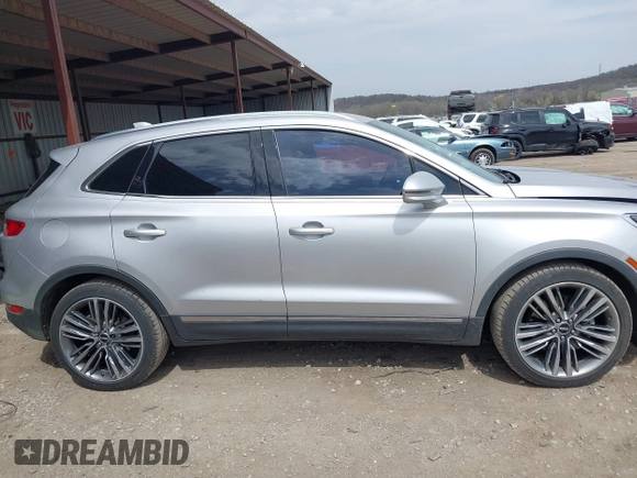 2015 Lincoln MKC with VIN 5LMTJ2AH8FUJ23341, listed as a IAAI auction lot 41828159 with 103,562 mi miles. Bid and sale history available at carsss.com. Image 14.