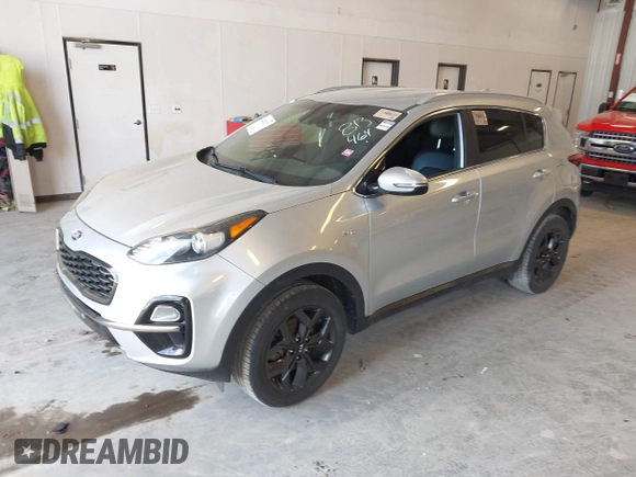 2020 Kia Sportage S with VIN KNDP6CAC3L7813464, listed as a IAAI auction lot 42128252 with 76,271 mi miles. Bid and sale history available at carsss.com. Image 2.
