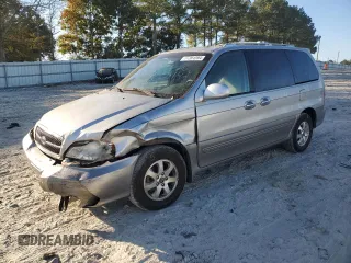2004 Kia Sedona LX with VIN KNDUP131346508490, listed as a Copart auction lot 77391594 with 41,211 mi miles and Salvage Title. Bid and sale history available at carsss.com. Image 1.