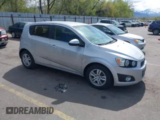 2013 Chevrolet Sonic LT with VIN 1G1JC6SG5D4210853, listed as a IAAI auction lot 42078806 with 135,837 mi miles. Bid and sale history available at carsss.com. Image 1.