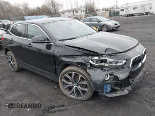 2019 BMW X2 xDrive28i with VIN WBXYJ5C50K5N03198, listed as a IAAI auction lot 41999528 with 28,949 mi miles. Bid and sale history available at carsss.com. Image 1.