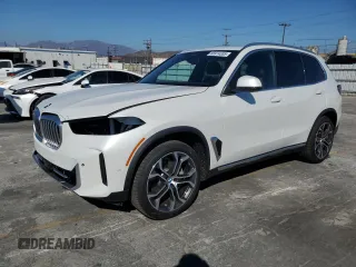 2025 BMW X5 sDrive40i with VIN 5UX13EU05S9Y44938, listed as a Copart auction lot 66914335 with 2,832 mi miles and Salvage title. Bid and sale history available at DreamBid. Image 1.