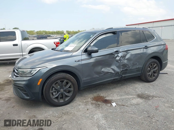 2024 Volkswagen Tiguan SE with VIN 3VVNB7AX4RM138429, listed as a IAAI auction lot 42303215 with Not provided miles and . Bid and sale history available at DreamBid. Image 2.