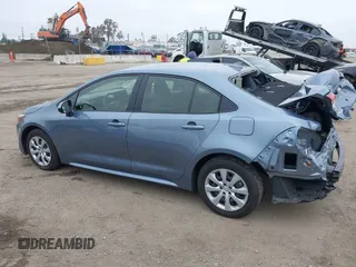 2023 Toyota Corolla Hybrid LE with VIN JTDBCMFE8PJ013271, listed as a IAAI auction lot 42099797 with 14,080 mi miles and . Bid and sale history available at carsss.com. Image 15.