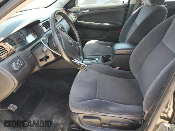 2013 Chevrolet Impala LS with VIN 2G1WF5E36D1203163, listed as a Copart auction lot 52684025 with 118,674 mi miles and Salvage Title. Bid and sale history available at DreamBid. Image 7.