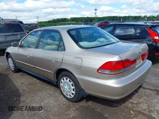 2001 Honda Accord LX with VIN 1HGCG66501A005789, listed as a IAAI auction lot 42217613 with 135,801 mi miles and . Bid and sale history available at DreamBid. Image 3.