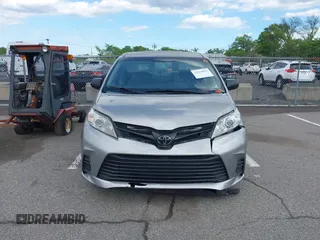 2018 Toyota Sienna L with VIN 5TDZZ3DC4JS945535, listed as a IAAI auction lot 42219652 with 129,059 mi miles and . Bid and sale history available at DreamBid. Image 12.