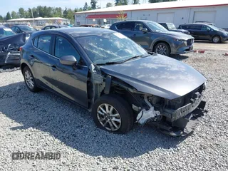 2015 Mazda 3 i Touring z VIN JM1BM1L73F1238360, wystawiony jako IAAI lot #42455285 z przebiegiem 124 319 mil mil oraz . Historia ofert i sprzedaży dostępna na DreamBid. Obrazek 1.