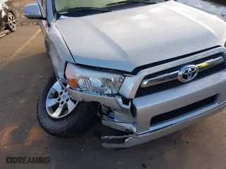 2012 Toyota 4Runner SR5 with VIN JTEBU5JR6C5102512, listed as a IAAI auction lot 41291233 with 164,476 mi miles. Bid and sale history available at carsss.com. Image 6.