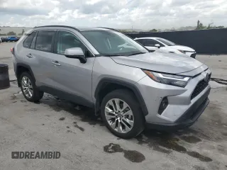2024 Toyota RAV4 XLE Premium with VIN 2T3C1RFV7RC274727, listed as a Copart auction lot 60647645 with 21,390 mi miles and Salvage title. Bid and sale history available at DreamBid. Image 4.