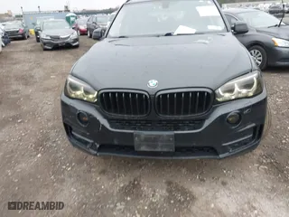 2015 BMW X5 xDrive35i with VIN 5UXKR0C54F0P00889, listed as a IAAI auction lot 42023099 with 196,387 mi miles. Bid and sale history available at carsss.com. Image 12.