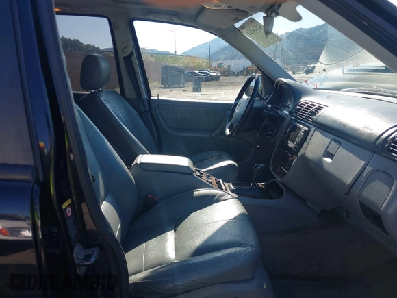 2001 Mercedes-Benz M-Class with VIN 4JGAB54E01A272539, listed as a IAAI auction lot 42124321 with 272,098 mi miles. Bid and sale history available at carsss.com. Image 5.