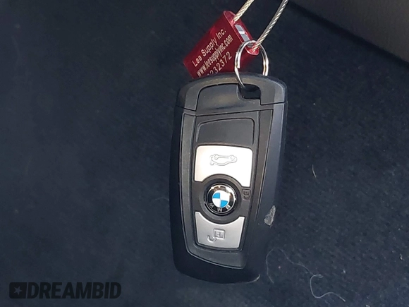 2015 BMW 3 Series 320i with VIN WBA3B1C53FK138310, listed as a IAAI auction lot 41677208 with 57,891 mi miles. Bid and sale history available at carsss.com. Image 11.