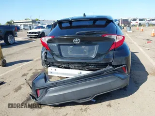 2020 Toyota C-HR LE with VIN JTNKHMBX9L1063563, listed as a IAAI auction lot 41986457 with 143,694 mi miles. Bid and sale history available at carsss.com. Image 17.