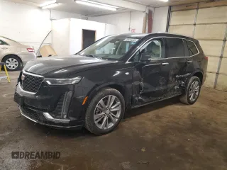 2023 Cadillac XT6 AWD Premium Luxury with VIN 1GYKPDRS0PZ209335, listed as a Copart auction lot 48555685 with 30,375 mi miles and Salvage title. Bid and sale history available at DreamBid. Image 1.