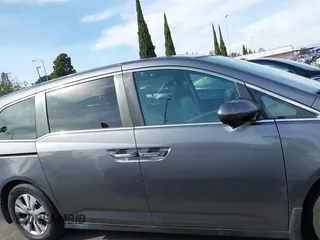 2014 Honda Odyssey EX-L with VIN 5FNRL5H64EB055807, listed as a IAAI auction lot 41760758 with 144,346 mi miles and . Bid and sale history available at carsss.com. Image 13.