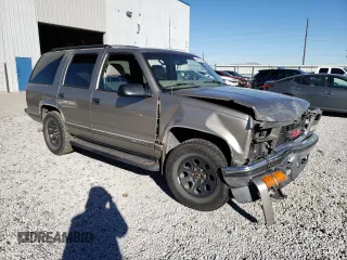 1998 GMC Yukon with VIN 1GKEK13R1WR508227, listed as a Copart auction lot 88325315 with 238,085 mi miles and Salvage Title. Bid and sale history available at carsss.com. Image 4.