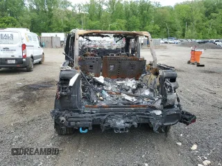 2023 Jeep Wrangler Sahara z VIN 1C4JJXP66PW698724, wystawiony jako Copart lot #55587825 z przebiegiem Nie podano mil oraz Nie do naprawy • Non repairable. Historia ofert i sprzedaży dostępna na DreamBid. Obrazek 6.