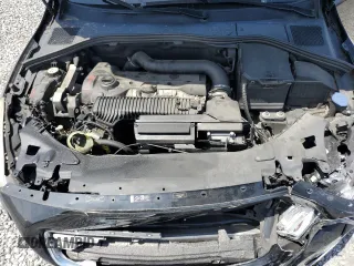 2013 Volvo S60 T5 Premier z VIN YV1612FS5D2186974, wystawiony jako Copart lot #57960215 z przebiegiem 142 598 mil mil oraz Szkody całkowita. Historia ofert i sprzedaży dostępna na DreamBid. Obrazek 11.