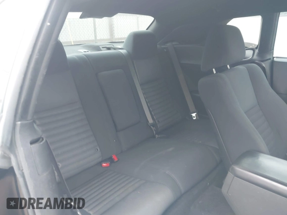 2013 Dodge Challenger SXT z VIN 2C3CDYAGXDH718768, wystawiony jako IAAI lot #41339735 z przebiegiem 187 052 mil mil oraz . Historia ofert i sprzedaży dostępna na DreamBid. Obrazek 8.